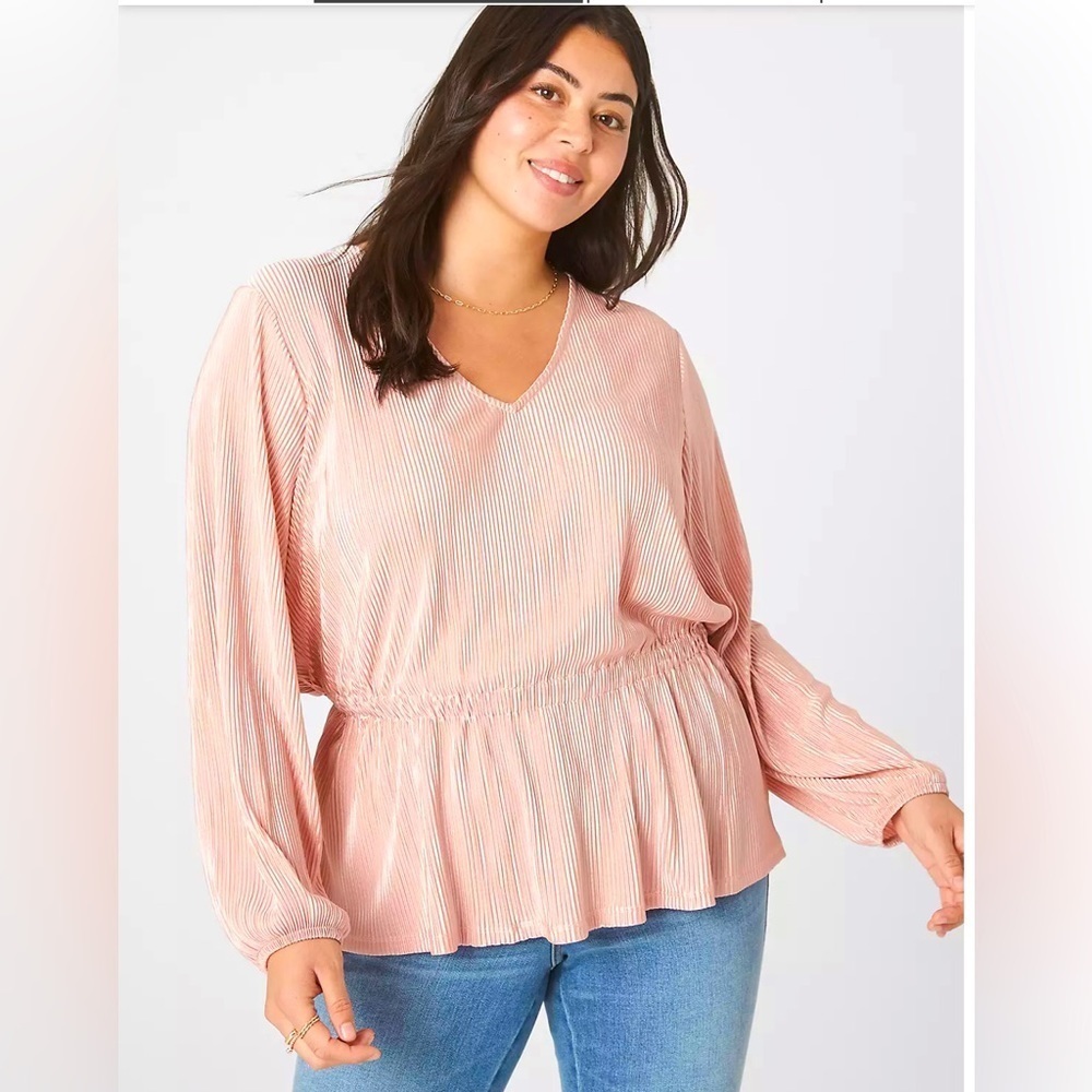 Satin pink blouse w/peplum hem for a flattering and feminine silhouette.